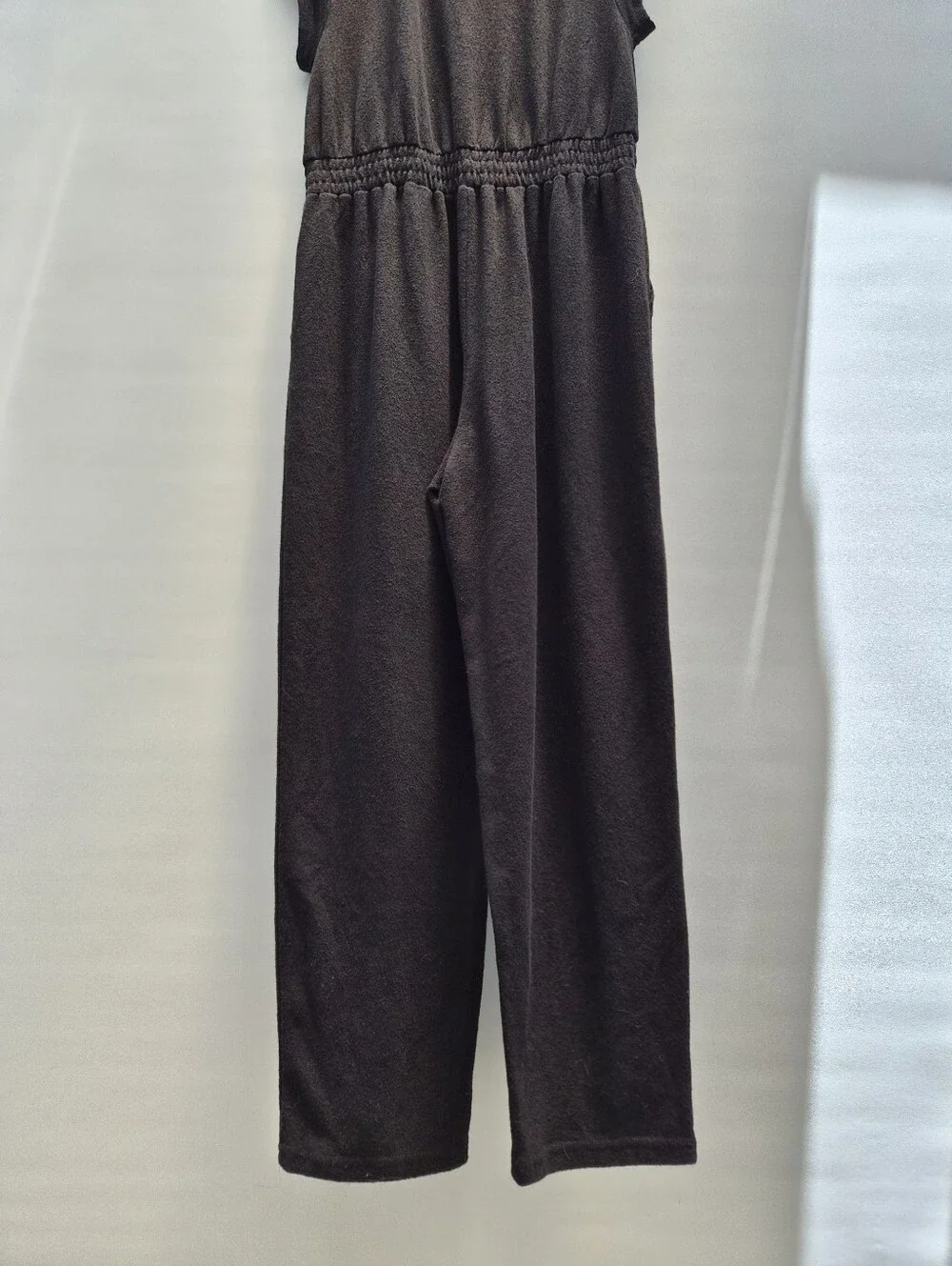 Free People Beach Rita Jumpsuit M Black Terry Knit Deep V Minimalist Resortwear